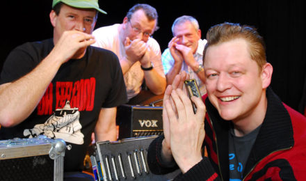 Happy people at harmonica workshop