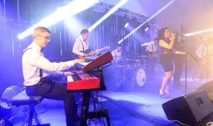 Band on stage at corporate event